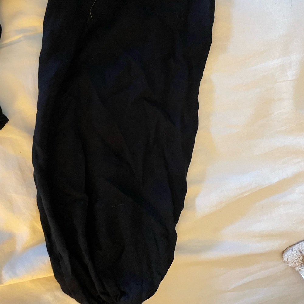 Never worn low cut long sleeve blouse.
